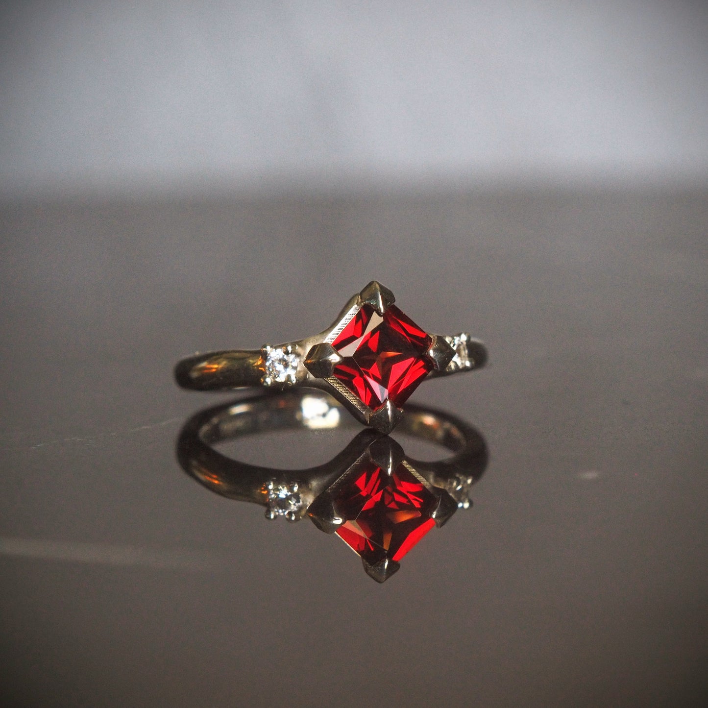 Princess Garnet ring with White Sapphires