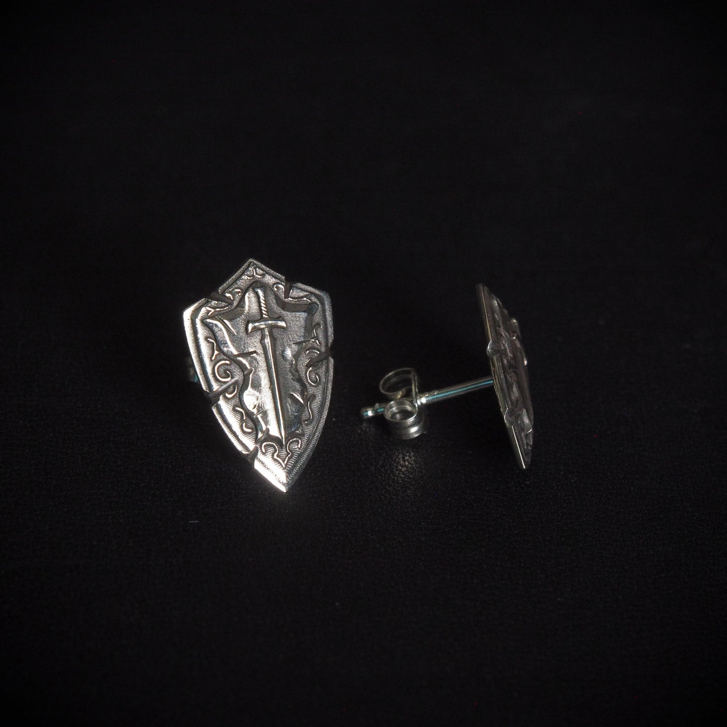 Battlescarred Shield Stud Earrings